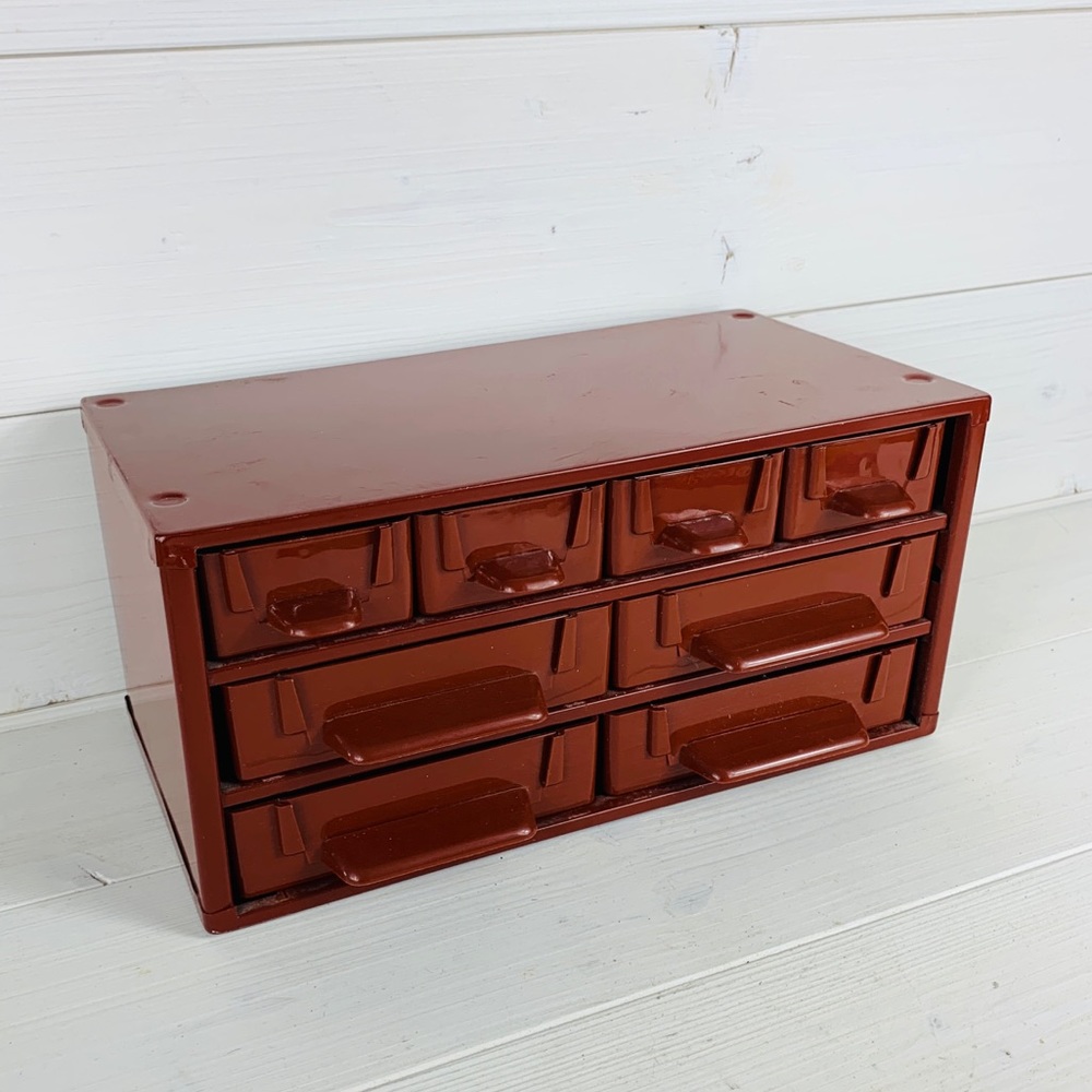 Vintage metal and plastic storage box with small compartment.
